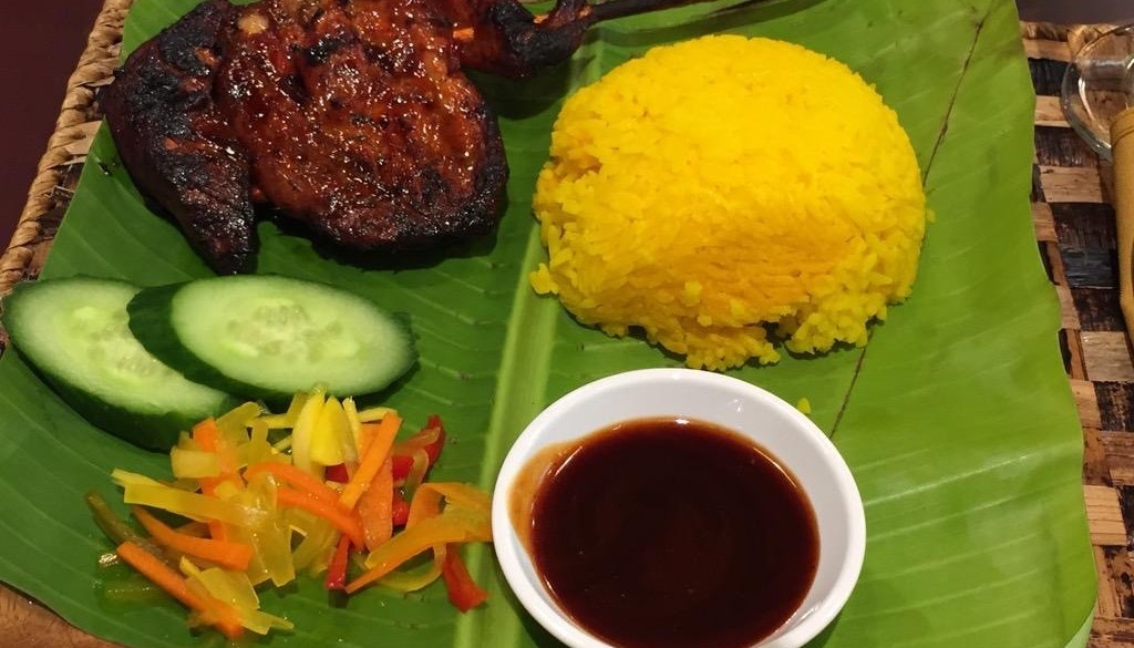 Java Rice & BBQ meal on banana leaf