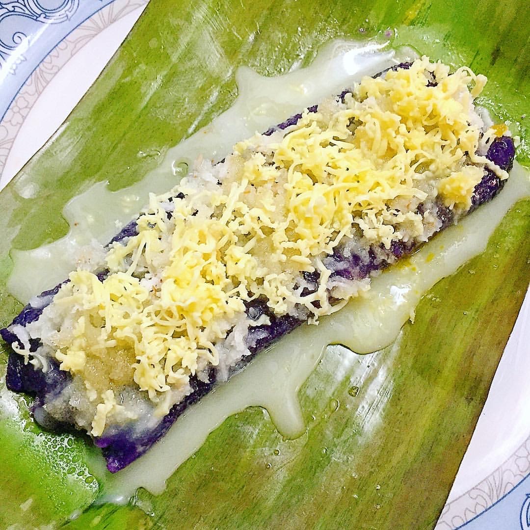 puto bumbong topped with cheese